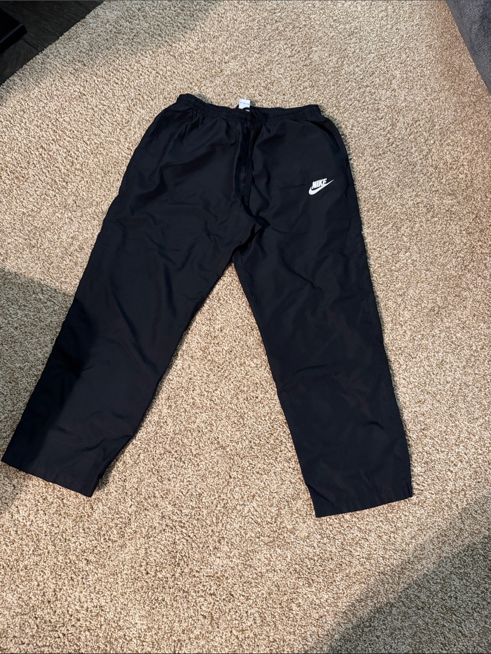 Nike Black Track Pants with White Swoosh Logo
